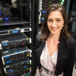 lab photo of Professor Giulia Palermo looking at camera 